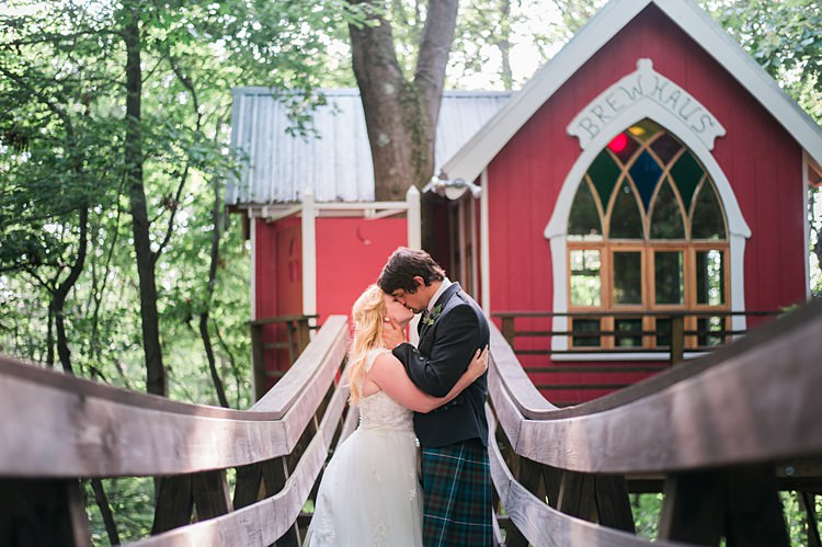 Bride Groom Kiss Bride Tartan Kilt Gown Dress Lace Cap Sleeve Curls Whimsical Woods Wedding Barn Ohio http://www.connectionphotoblog.com/
