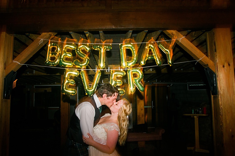 Best Day Ever Balloons Bride Groom Kiss Whimsical Woods Wedding Barn Ohio http://www.connectionphotoblog.com/