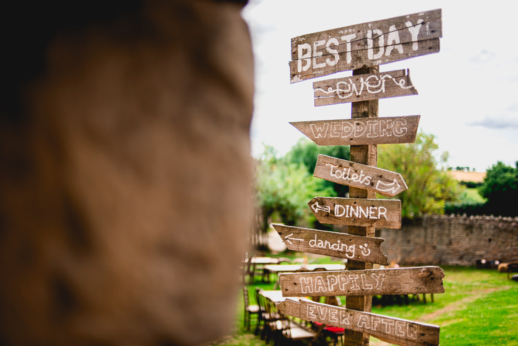 Wooden Sign Post Directions Eclectic Outdoor Barn Wedding https://www.barneywalters.com/