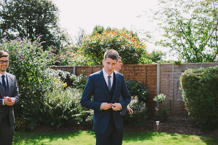 Gorom Suit Moss Bros Navy Three Piece Fairy Lights Vibrant Florals Summer Barn Wedding https://www.oliviajudah.co.uk/