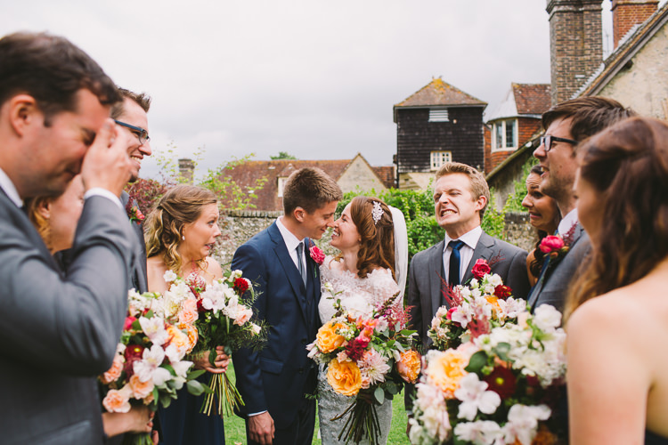 Bride Bridal Dress Gown Sweetheart Neckline Lace Jacket Diamante Belt Moss Bros Groom Navy Suit Three Piece Waistcoat Bouquet Dahlia Rose Berries Greenery Veil Bridesmaids Groomsmen Usher Fairy Lights Vibrant Florals Summer Barn Wedding https://www.oliviajudah.co.uk/
