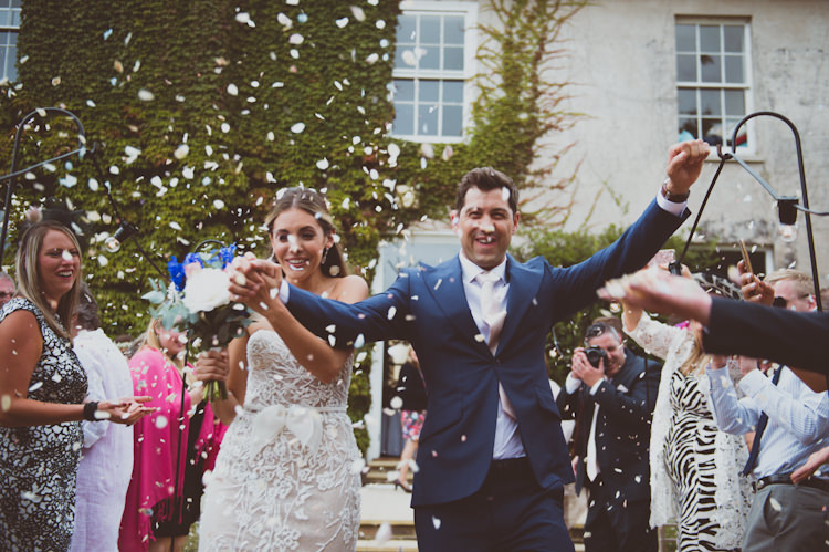 Confetti Throw Bride Groom Stylish Festival Tipi Wedding http://sashaweddings.co.uk/