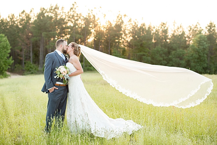 Bride Updo Long Veil Lace Gown Sweetheart Neckline Groom Grey Blue Intimate Farmhouse Wedding South Carolina https://jessicahuntphotography.com/