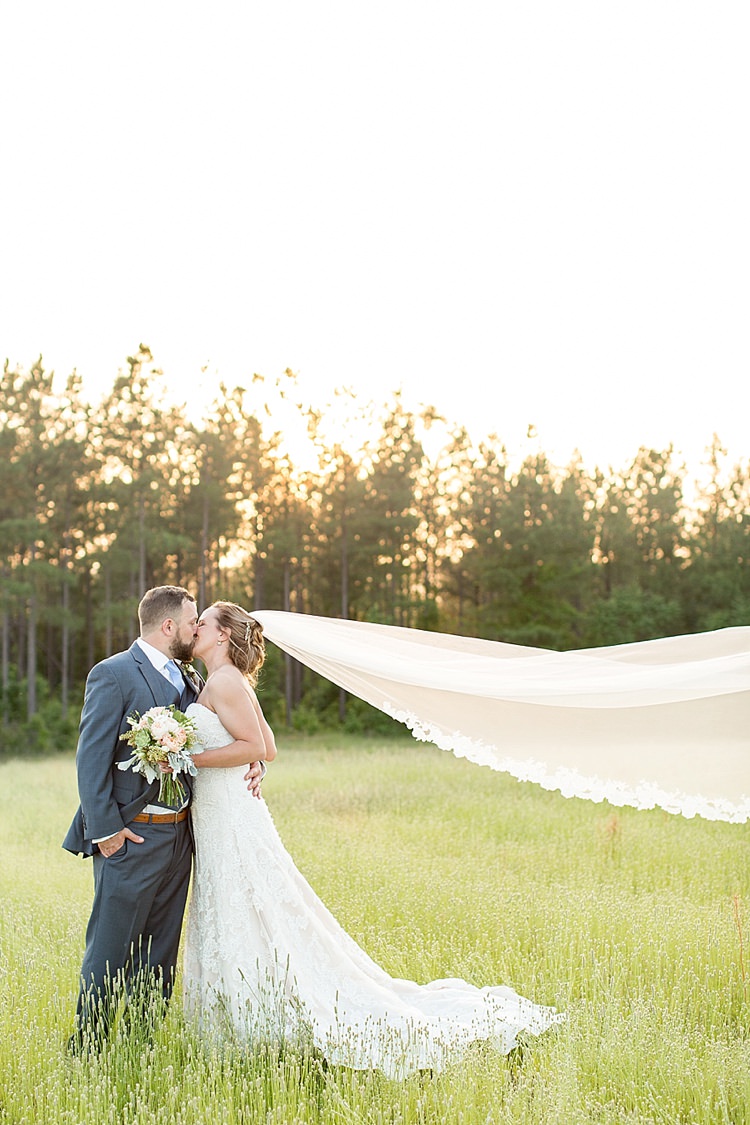 Bride Updo Long Veil Lace Gown Sweetheart Neckline Groom Grey Blue Intimate Farmhouse Wedding South Carolina https://jessicahuntphotography.com/