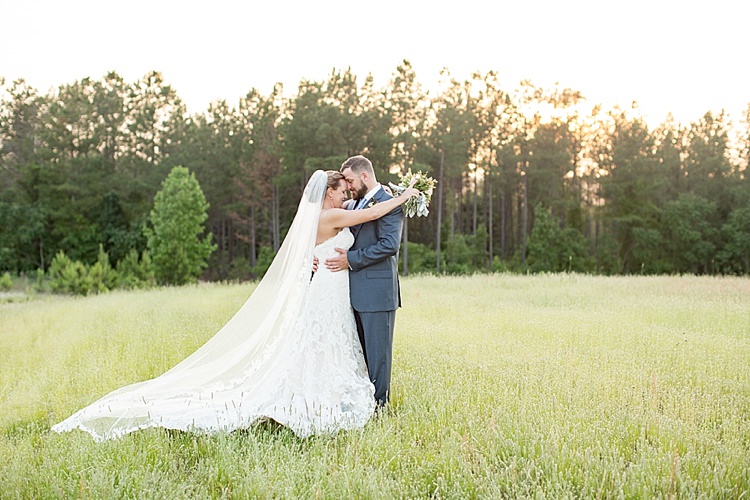 Bride Updo Long Veil Lace Gown Sweetheart Neckline Groom Grey Blue Intimate Farmhouse Wedding South Carolina https://jessicahuntphotography.com/
