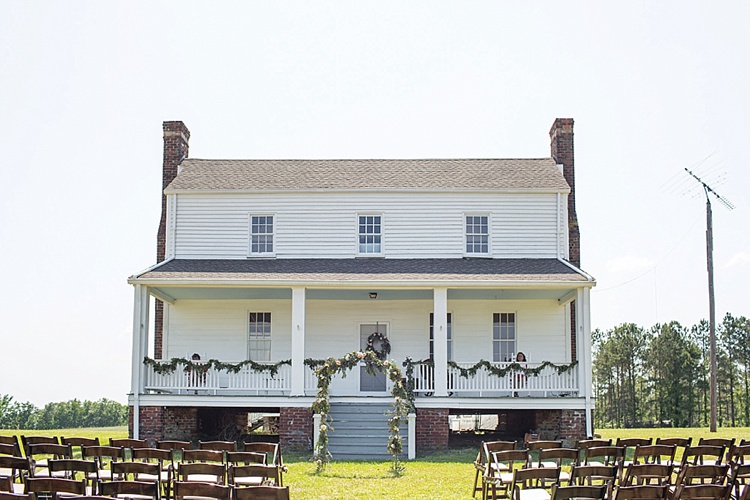 Farmhouse Outdoor Ceremony Archway Greenery Intimate Farmhouse Wedding South Carolina https://jessicahuntphotography.com/
