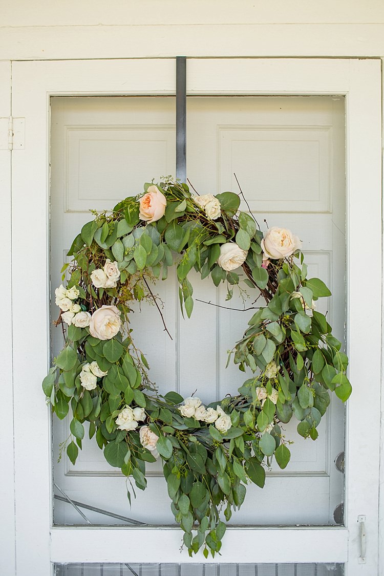 Wreath Greenery Roses White Blush Pink Peach Intimate Farmhouse Wedding South Carolina https://jessicahuntphotography.com/