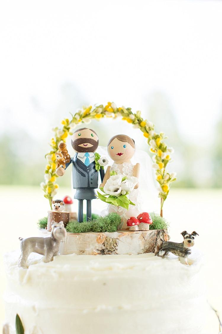 Cake Figurines Topper Pets White Tiers Flowers Greenery Rustic Intimate Farmhouse Wedding South Carolina https://jessicahuntphotography.com/
