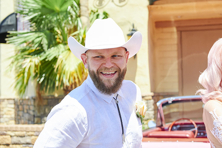 Groom White Outfit Cowboy Hat Beard Hip Elvis Las Vegas Destination Wedding http://www.roseimages.co.uk/