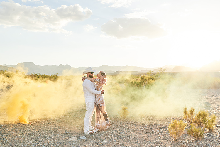 Yellow Smoke Desert Groom Cowboy Hat White Bride Pink Hair Blush Gown Lace Sheer Tattoos Hip Elvis Las Vegas Destination Wedding http://www.roseimages.co.uk/