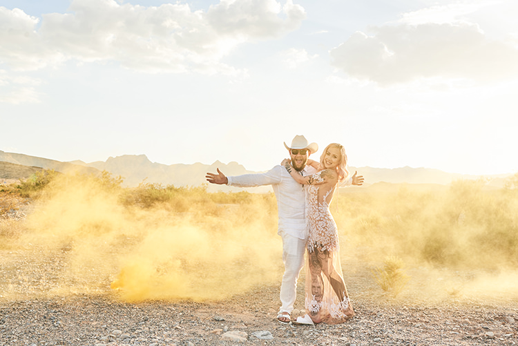Yellow Smoke Desert Groom Cowboy Hat White Bride Pink Hair Blush Gown Lace Sheer Tattoos Hip Elvis Las Vegas Destination Wedding http://www.roseimages.co.uk/