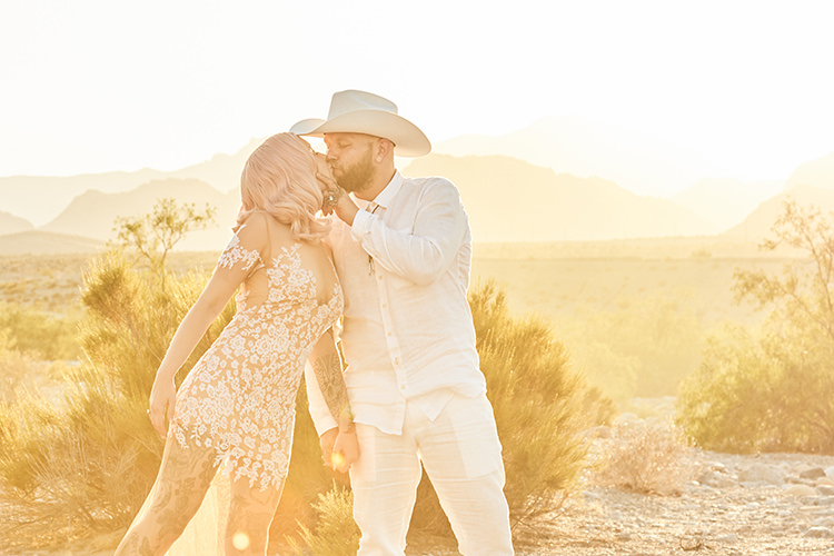 Yellow Smoke Desert Groom Cowboy Hat White Bride Pink Hair Blush Gown Lace Sheer Tattoos Hip Elvis Las Vegas Destination Wedding http://www.roseimages.co.uk/