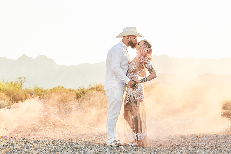 Smoke Desert Groom Cowboy Hat White Bride Pink Hair Blush Gown Lace Sheer Tattoos Hip Elvis Las Vegas Destination Wedding http://www.roseimages.co.uk/