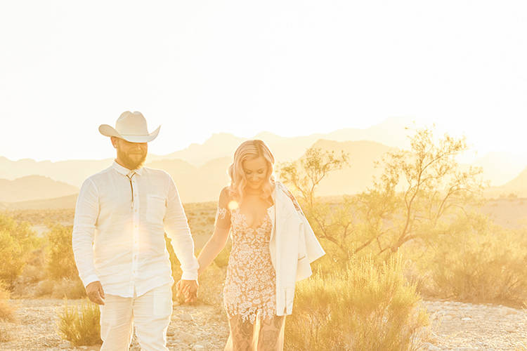 Leather Jacket Sunset Desert Groom Cowboy Hat White Bride Pink Hair Blush Gown Lace Sheer Tattoos Hip Elvis Las Vegas Destination Wedding http://www.roseimages.co.uk/