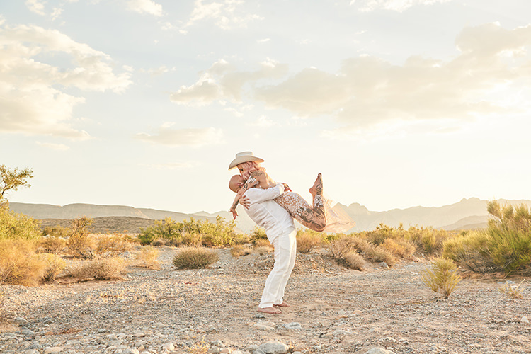 Lift Kiss Desert Groom Cowboy Hat White Bride Pink Hair Blush Gown Lace Sheer Tattoos Hip Elvis Las Vegas Destination Wedding http://www.roseimages.co.uk/