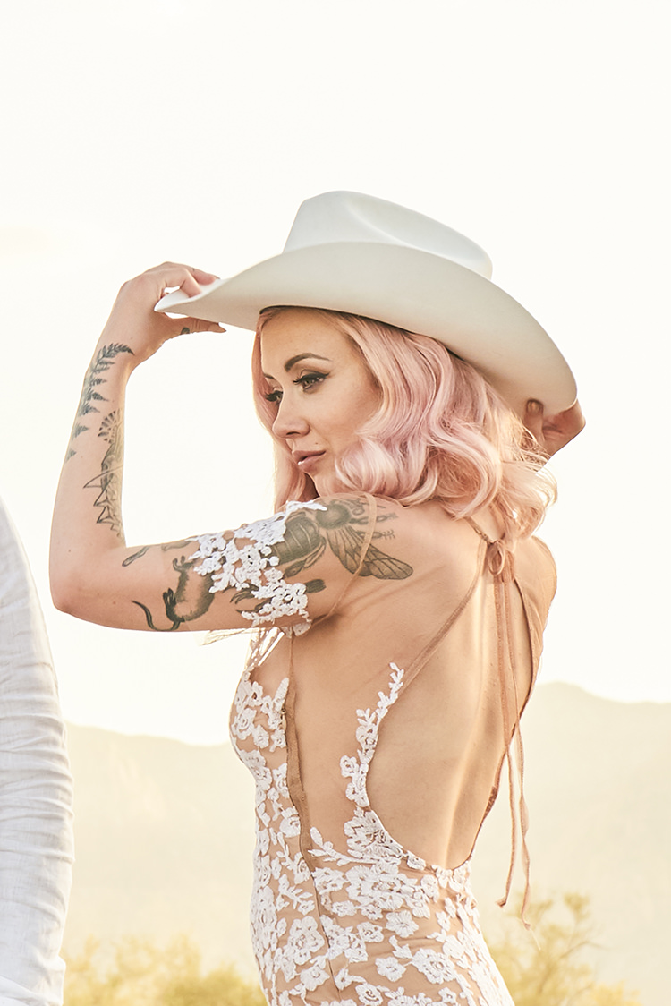 Desert Cowboy Hat White Bride Pink Hair Blush Gown Lace Sheer Tattoos Hip Elvis Las Vegas Destination Wedding http://www.roseimages.co.uk/