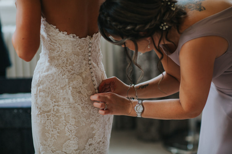 Bride Bridal Pronovias Lace Overlay Button Back Low Chic Romantic Florals Candlelight Wedding http://lisawebbphotography.co.uk/
