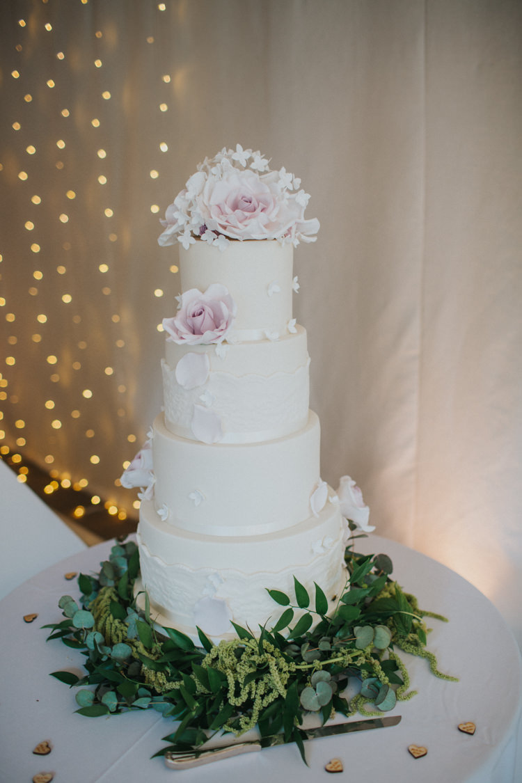 Cake Classic White Icing Rose Greenery Four Tier Chic Romantic Florals Candlelight Wedding http://lisawebbphotography.co.uk/