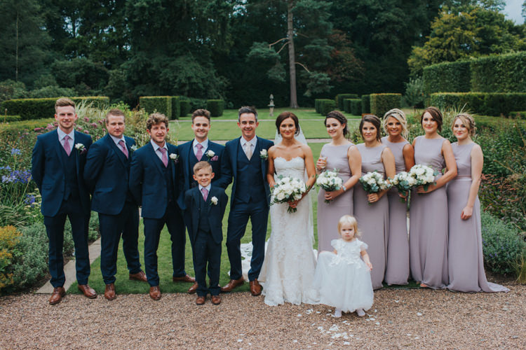 Bridesmaids ASOS TFNC Lavender Purple Dusky Flower Girl Bride Bridal Pronovias Strapless Sweetheart Fishtail Train Veil White Rose Bouquet Navy Suit Groom Chic Romantic Florals Candlelight Wedding http://lisawebbphotography.co.uk/