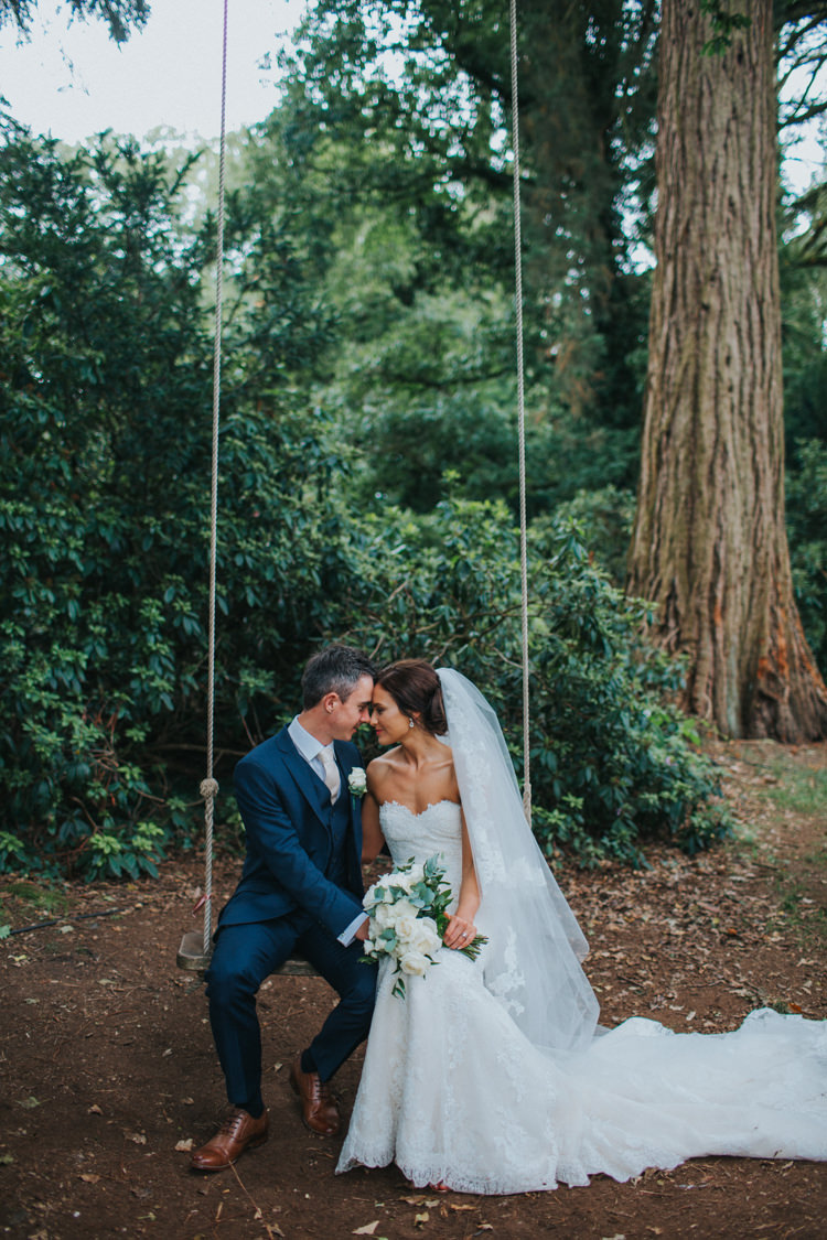 Bride Bridal Pronovias Strapless Sweetheart Fishtail Train Veil White Rose Bouquet Navy Suit Groom Swing Couples Portraits Chic Romantic Florals Candlelight Wedding http://lisawebbphotography.co.uk/