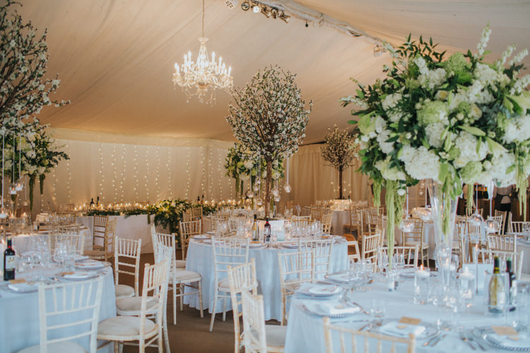 Blossom Trees Tall Centrepiece Table Centre Marquee White Rose Greenery Stocks Chic Romantic Florals Candlelight Wedding http://lisawebbphotography.co.uk/