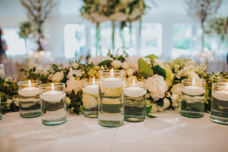 Floating Candles White Rose Greenery Chic Romantic Florals Candlelight Wedding http://lisawebbphotography.co.uk/