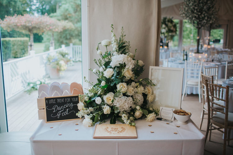 Guest Book Cards Table White Rose Greenery Flip Flops Dancing Feet Chic Romantic Florals Candlelight Wedding http://lisawebbphotography.co.uk/