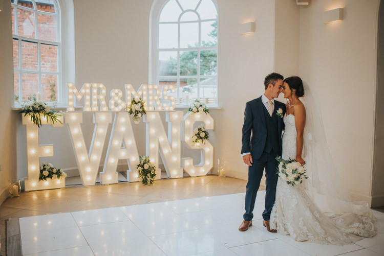 Bride Bridal Pronovias Strapless Sweetheart Fishtail Train Veil White Rose Bouquet Navy Suit Groom Light Up Circus Letters Chic Romantic Florals Candlelight Wedding http://lisawebbphotography.co.uk/