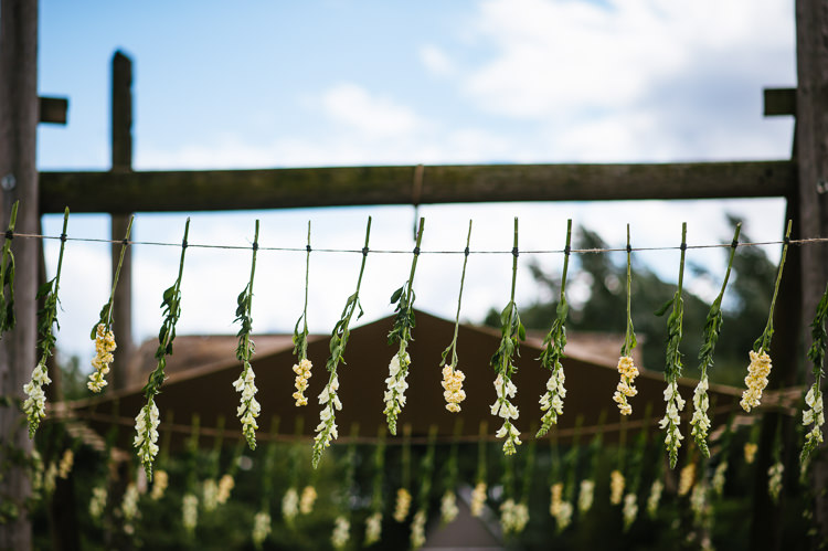 Hanging Flowers Ceremony Decor Magical Woodland Glade Tipi Wedding http://johnnydent.co.uk/