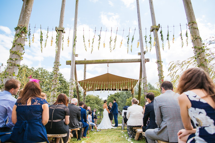 Hanging Flowers Ceremony Backdrop Magical Woodland Glade Tipi Wedding http://johnnydent.co.uk/