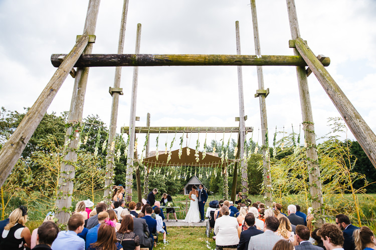 Hanging Flowers Ceremony Backdrop Magical Woodland Glade Tipi Wedding http://johnnydent.co.uk/