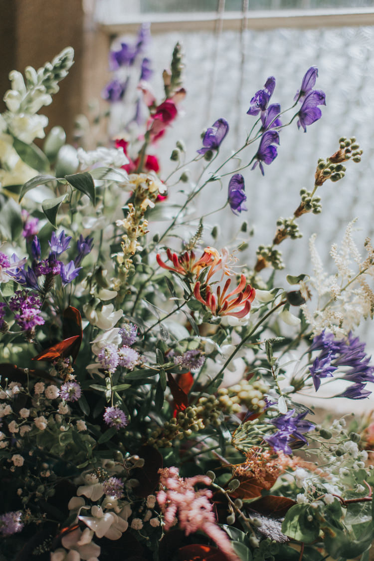 Flowers Wild Natural Summer Incredibly Pretty Thoughtful Tipi Wedding http://katewatersphotography.com/