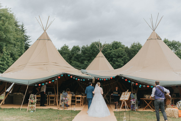 Incredibly Pretty Thoughtful Tipi Wedding http://katewatersphotography.com/