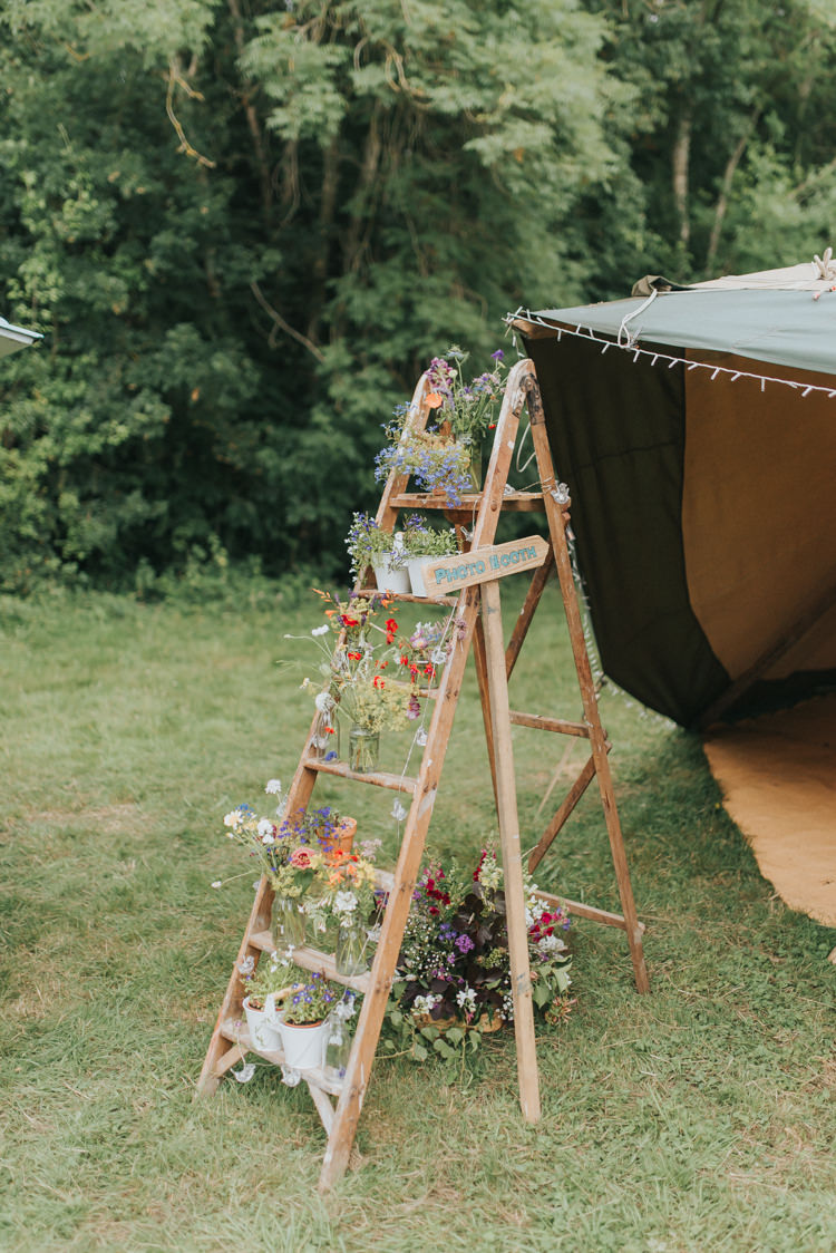 Wooden Ladder Flowers Decor DIY Rustic Incredibly Pretty Thoughtful Tipi Wedding http://katewatersphotography.com/