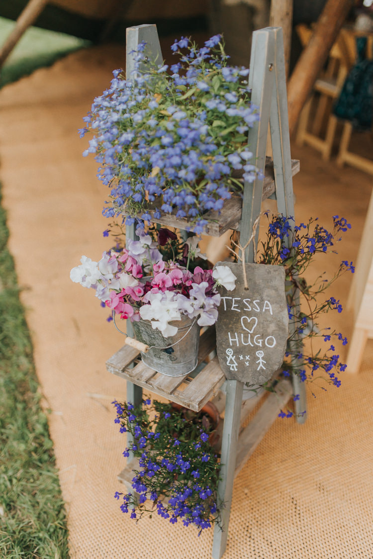 Wooden Ladder Flowers Decor DIY Rustic Incredibly Pretty Thoughtful Tipi Wedding http://katewatersphotography.com/