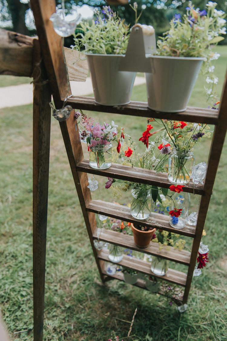Wooden Ladder Flowers Decor DIY Rustic Incredibly Pretty Thoughtful Tipi Wedding http://katewatersphotography.com/