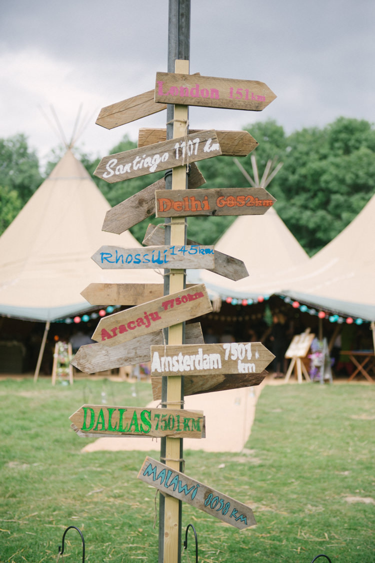 Painted Wooden Sign Post Directions Incredibly Pretty Thoughtful Tipi Wedding http://katewatersphotography.com/
