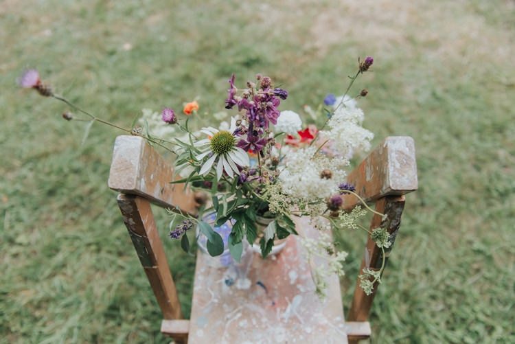 Wooden Ladder Flowers Decor DIY Rustic Incredibly Pretty Thoughtful Tipi Wedding http://katewatersphotography.com/