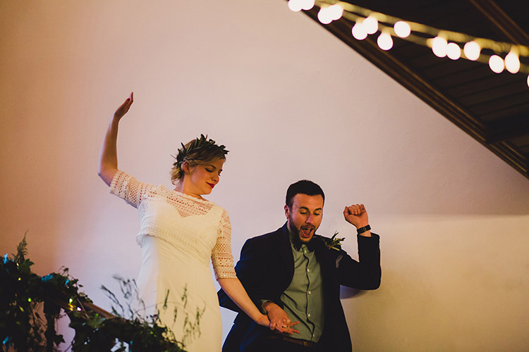 Bride Bridal Lace Guipure Topper Sleeves Dress Gown Veil Greenery Foliage Leaf Crown Bespoke Groom Bow Tie Staircase Fairy Lights Fun Happy Colourful Wedding Vegetable Bouquets https://mylo-photography.co.uk/