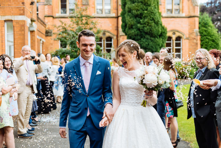 Bride Bridal V Back Ian Stuart Polka Dot Tulle Dress Gown Reiss Groom Airforce Blue Confetti Shot Moment Cute Summer Festival Tipi Wedding http://www.daffodilwaves.co.uk/