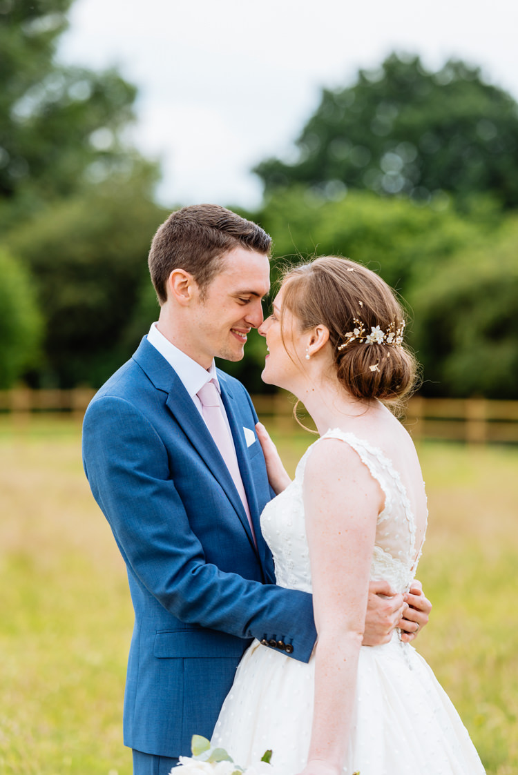 Bride Bridal V Back Ian Stuart Polka Dot Tulle Dress Gown Chignon Hair Piece Reiss Blue Airforce Groom Cute Summer Festival Tipi Wedding http://www.daffodilwaves.co.uk/