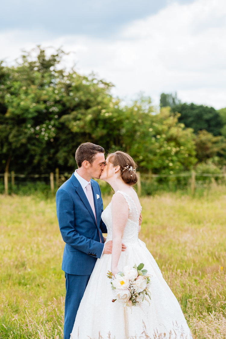 Bride Bridal V Back Ian Stuart Polka Dot Tulle Dress Gown Chignon Hair Piece Reiss Blue Airforce Groom Bouquet Rose Gypsophila Cute Summer Festival Tipi Wedding http://www.daffodilwaves.co.uk/