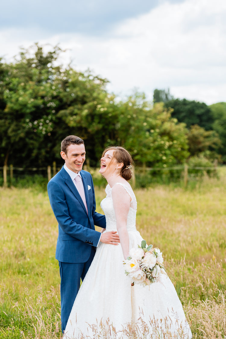 Bride Bridal V Back Ian Stuart Polka Dot Tulle Dress Gown Chignon Hair Piece Reiss Blue Airforce Groom Bouquet Rose Gypsophila Cute Summer Festival Tipi Wedding http://www.daffodilwaves.co.uk/