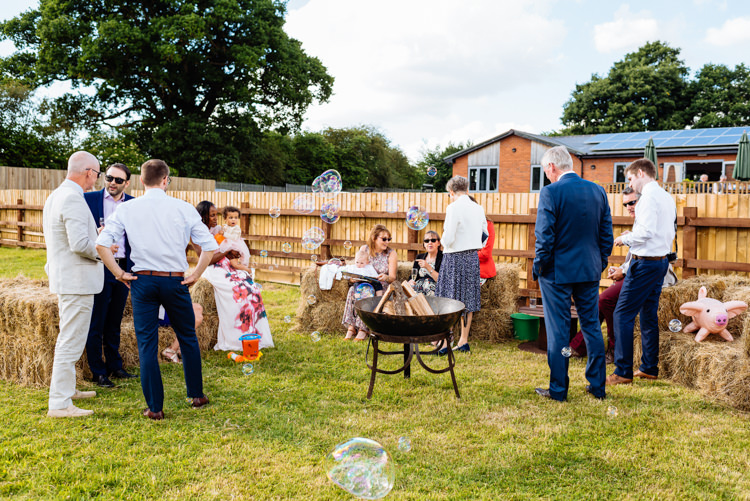 Hay Bales Fire Pit Lawn Games Bubbles Cute Summer Festival Tipi Wedding http://www.daffodilwaves.co.uk/