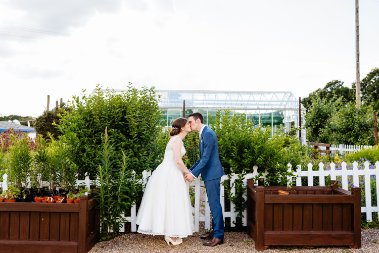 Bride Bridal V Back Ian Stuart Polka Dot Tulle Dress Ballerina Length Gown Chignon Hair Piece Reiss Blue Airforce Groom Cute Summer Festival Tipi Wedding http://www.daffodilwaves.co.uk/