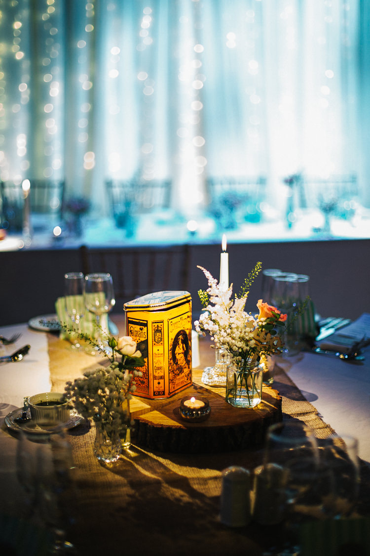 Centrepiece Decor Log Candle Flowers Jar Exquisite Relaxed Rustic Barn Wedding http://www.emiliemay.com/