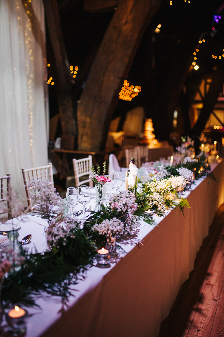 Top Table Swag Garland Flowers Greenery Exquisite Relaxed Rustic Barn Wedding http://www.emiliemay.com/