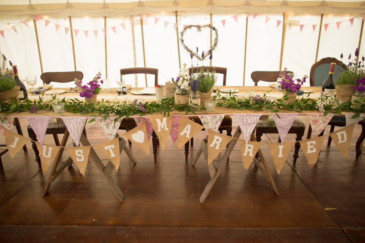 Bunting Just Married Foliage Mismatched Wooden Chairs Greenery Top Table Quirky Rustic Farm Wedding https://ragdollphotography.co.uk/