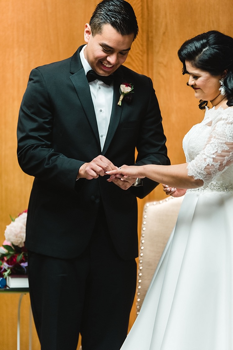Bride Groom Ring Exchange Vows Dress A Line Lace Sleeves Off Shoulder Bowtie Modern Romantic Winter Wedding Texas http://www.albarosephotography.com/