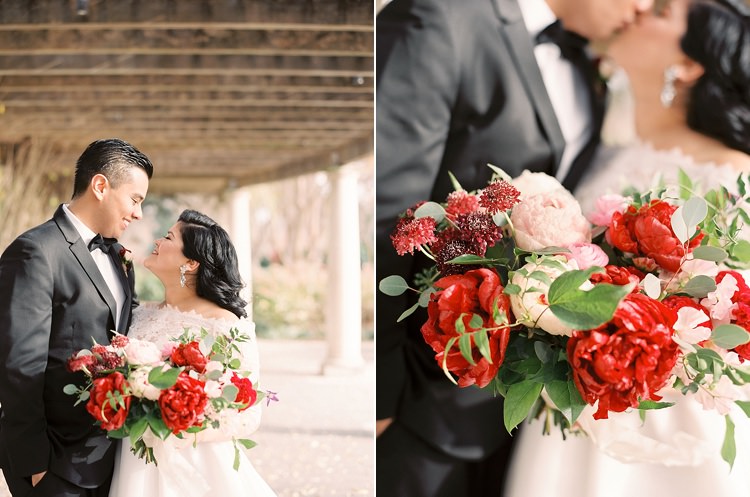 Bride Groom Garden Bowtie Lace Dress Off Shoulder Sleeves Bouquet Red Pink Peonies Roses Greenery Modern Romantic Winter Wedding Texas http://www.albarosephotography.com/